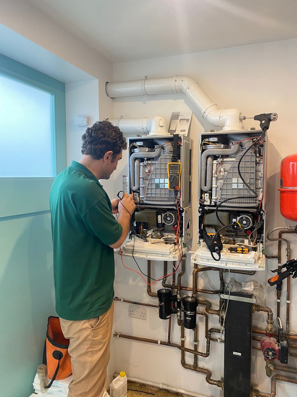 Alex servicing twin Vaillant boilers with full diagnostics